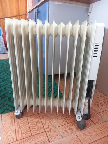 ev qızdırıcıları: Radiator orjinal.Çox yaxşı qızdırır.70 azn