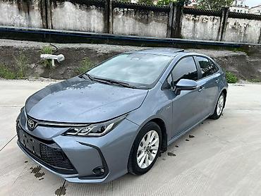 поможем: Toyota Corolla: 2025 г., 1.8 л, Вариатор, Гибрид, Седан — 2