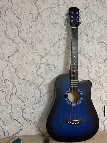 Akuistik gitara – dreadnought korpuslu, kəsikli (cutaway) dizayn. - lalafo.az -da Akuistik gitara – dreadnought korpuslu, kəsikli (cutaway) dizayn. -