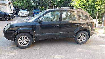 hundai tukson: Hyundai Tucson, qara rəng, 5 qapılı SUV. İli 2006-nın sonu(2007 — 6