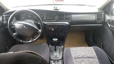 opel babin: Opel Astra: 1.6 l | 1999 il 528588 km Sedan — 5