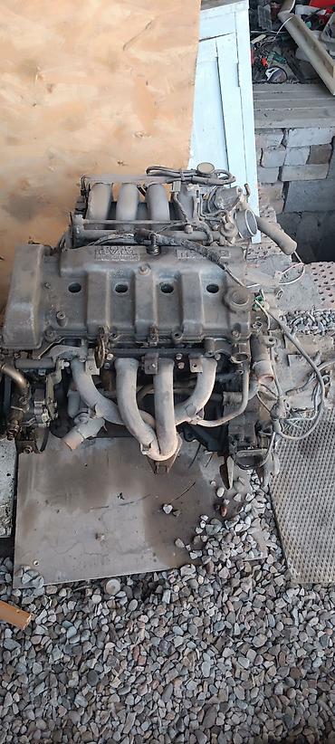 Продаю двигатель Мазда Кронос вместе скаробкой все