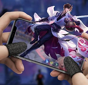 Кулеры, охладители для мобильных телефонов: Напальчники для игр HOCO GM4 2шт черные с серым Самый новый — 10
