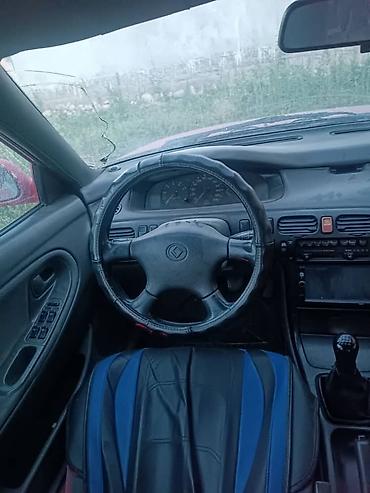 Продажа авто: Mazda Cronos: 1992 г., 2 л, Механика, Бензин, Хэтчбэк — 8
