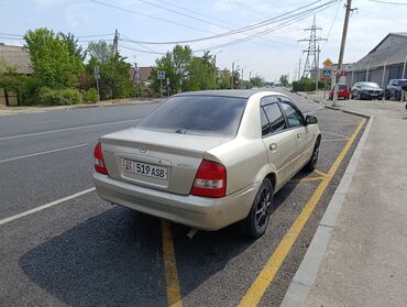 Mazda: Mazda 323: 2002 г., 2 л, Механика, Бензин, Седан — 4