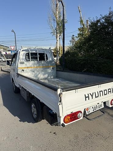 ось: Hyundai Porter (двухдверный бортовой малотоннажный грузовик) Объем — 5