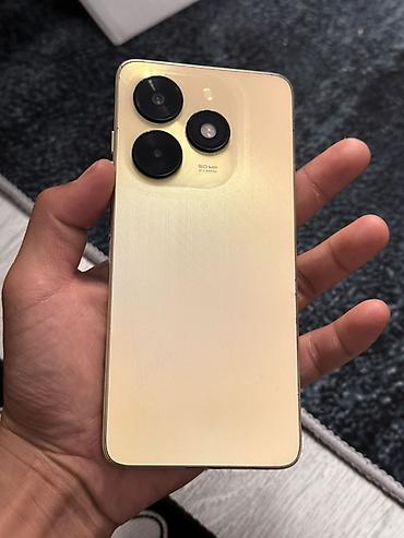 Tecno Spark 20C 128 гб, заряд держит долго, камеры норм, звук норм