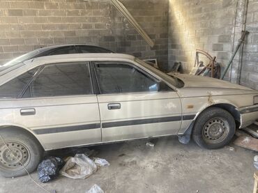 бампер на к5: Mazda 626: 1989 г., 2 л, Механика, Бензин, Хетчбек