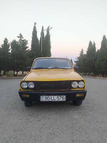 e60 guzgu: Tofaş Toros universal (sarı rəng) Xüsusiyyətlər: - Kuzov: 5 qapılı — 3