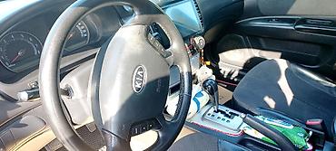 90 fa 373: Kia Optima: 2.7 l | 2008 il Sedan — 9