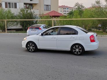 07 maşını: Hyundai Accent: 1.6 l | 2006 il Sedan