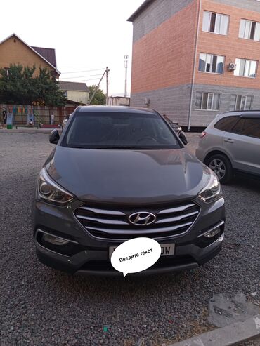 продажа хюндай: Кроссовер Hyundai Santa Fe серого цвета. Автомобиль оснащен стильными