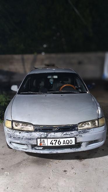 x pipe: Mazda 626: 1993 г., 2 л, Механика, Бензин, Хэтчбэк — 1