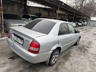 Mazda: Mazda Familia: 2001 г., 1.5 л, Автомат, Бензин, Седан