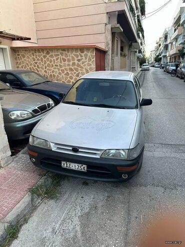 Toyota Corolla: 1.3 l | 1993 year Hatchback