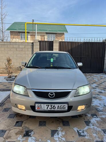 Mazda: Mazda 323: 2001 г., 1.6 л, Механика, Бензин, Седан