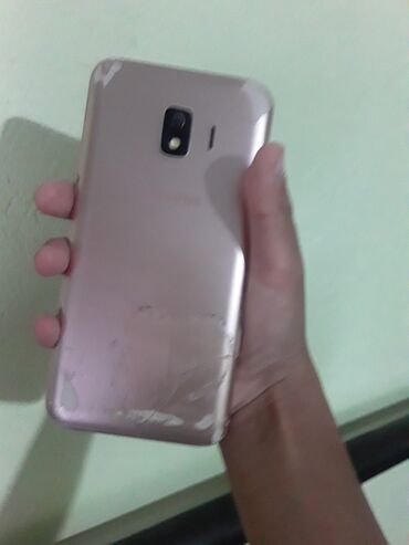 телефоны 1500: Samsung Galaxy J2 Core, Колдонулган, 8 GB, түсү - Саргыч боз, 2 SIM