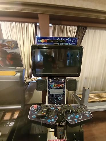 Digər oyun və konsollar: X bokus Arcade oyun aparatları – 2 ədəd Capcom temalı kabinet və 1 — 9