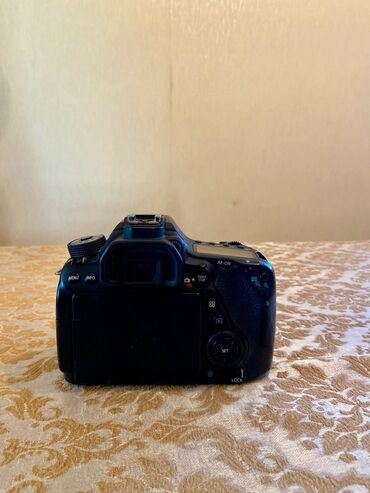 maqnitli adapter: Fotokamera mağazada məhsulların çəkilişi üçün istifadə edilib. Heç bir