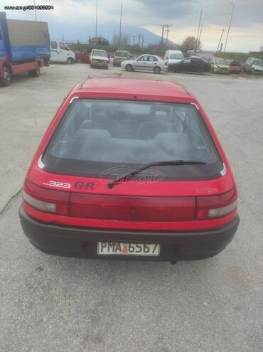 Mazda 323: 1.3 l. | 1990 year | Hatchback