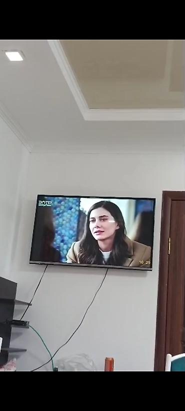 телевизор panasonic smart tv: Телевизор Panasonic, диагональ примерно 40–43". Плоская LED‑панель с — 4