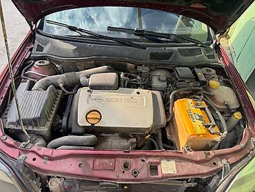 opel astra benzin: Opel Astra Caravan (Universal), qırmızı gövdə yalnız kredetlə — 1