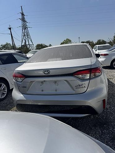 byd e6: Toyota Corolla: 2021 г., 1.8 л, Автомат, Гибрид, Седан — 6