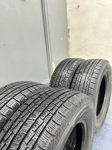 зимние шины на 14: Комплект автомобильных шин Goform размером 185/70 R14 88T. Зимние — 1