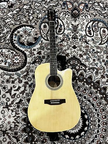 Музыкалык аспаптар: Акустическая гитара dreadnought с вырезом (cutaway) - Корпус формата — 1