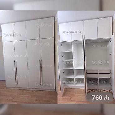 Ağ rəngli, çox bölməli qarderob şkafı. Ölçülər: 2,00 m (eni) x 2,70 m