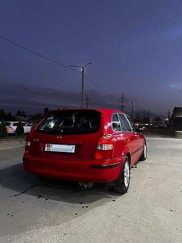 крафтер 2 5: Mazda 323: 1999 г., 1.8 л, Автомат, Бензин, Хэтчбэк — 4