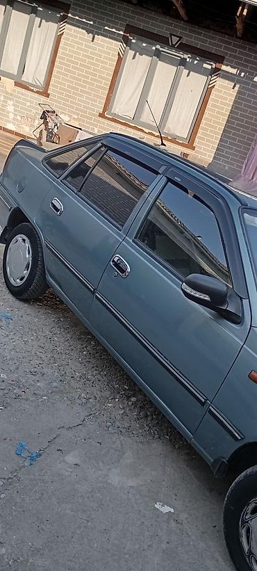 нек: Daewoo Nexia: 2006 г., Бензин, Седан — 4
