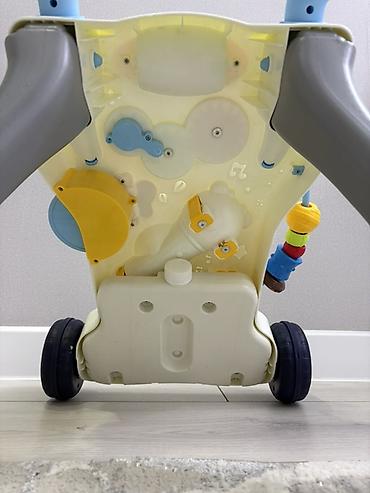 Детские ходунки: Развивающая каталка-ходунки для малышей - Устойчивая конструкция на 4 — 6