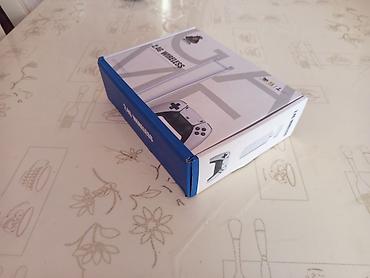 iphon 16 pro: 2.4G Wireless Game Stick Pro – TV üçün oyun konsolu seti — 2