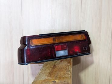 купить задний фонарь: Комплект стоп-сигналов Nissan 1989 г., Б/у, Оригинал