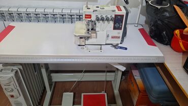 ламинация аппарат: Тигүүчү машина Оверлок, Жарым автоматтык
