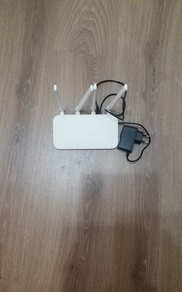 en ucuz komputer: Wi‑Fi router - Rəng: ağ - 3 ədəd xarici antena – siqnalın daha sabit
