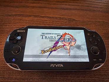 ps vita oyun konsolu: Ps vita qara qirilip istenilen oyun yuklene biler — 1
