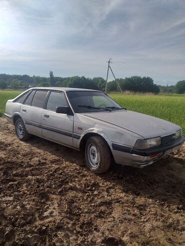машина опель: Mazda 626: 1985 г., 1.6 л, Механика, Бензин, Хетчбек