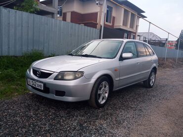 советские авто: Mazda 323: 2002 г., 1.6 л, Механика, Бензин, Универсал
