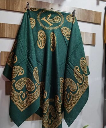 Baş geyimləri: Kəlağayılar. Bu kəlağayıların içi boş K hərfi ilə yazılıdı. Materialı — 13