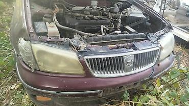 Nissan Bluebird: 2000 г.
