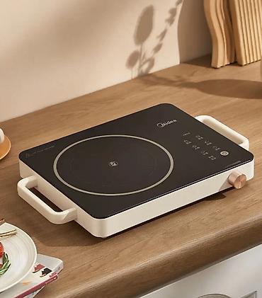 walking pad: Керамическая плита от Midea
2.2Kw
Сенсорное управление +ручка — 2