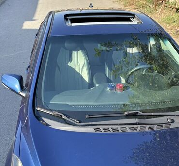 Hyundai Elantra: 1.8 л | 2015 г. Седан