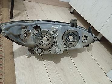 Передние фары: Передняя левая фара Toyota Оригинал — 1