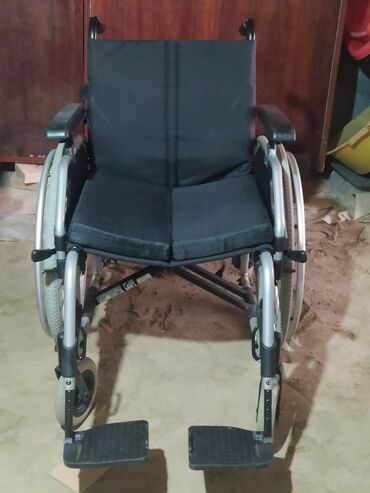 əlil arabalari: Инвалидные коляски