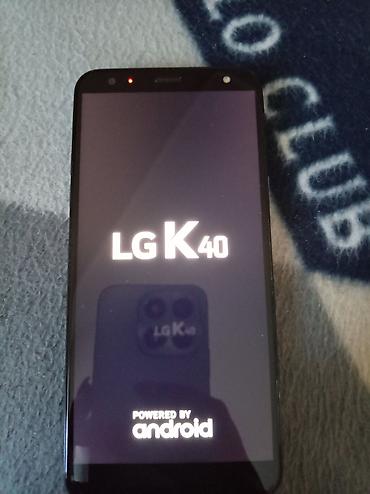 trimer za nausnice: Lg K40.Potpuno ispravan,ne baguje kamera mu je top.Telefon u odličnom — 1