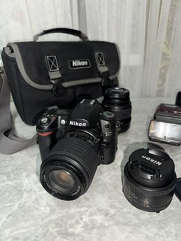 Фотоаппараты: Зеркальный фотоаппарат Nikon с комплектом оптики и аксессуаров — 10