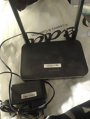 Modemlər və şəbəkə avadanlıqları: Nokia Wi‑Fi router – 2 antenalı, adapteri və kabeli ilə — 2