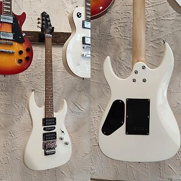 Gitaralar: Elektro-gitara Smiger S-G5 WH Simlərin sayı: 6 Üst: Cökə ağacı Qol — 1